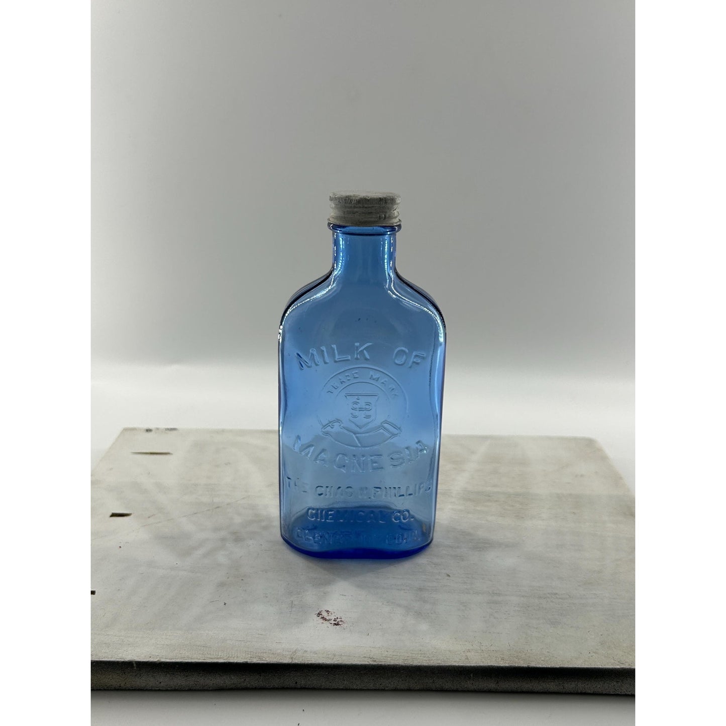 Antique Apothecary Milk of Magnesia Bottle c. 1910–1925 | Blue Glass Chas H Phillips Chemical Co. Cobalt blue apothecary bottle decor
