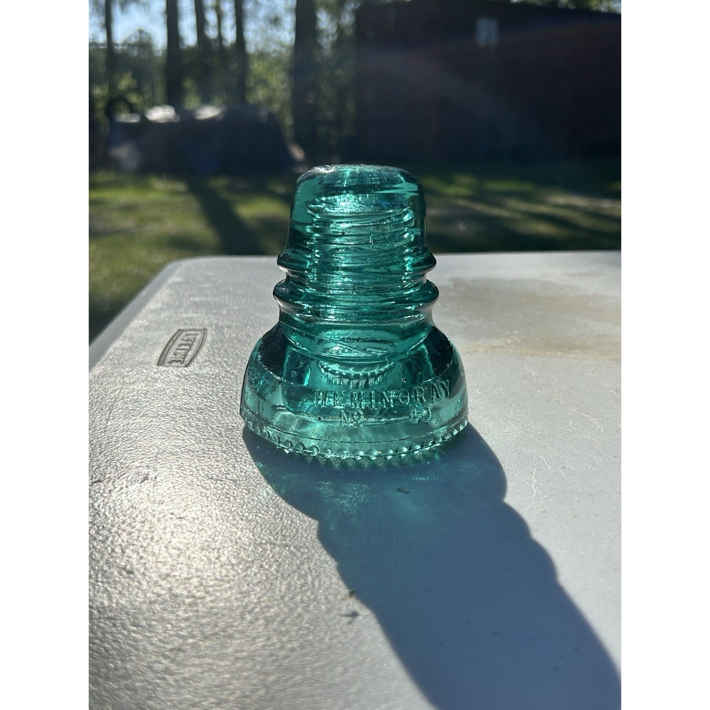 Vintage Hemingray petticoat glass insulator aqua natural light