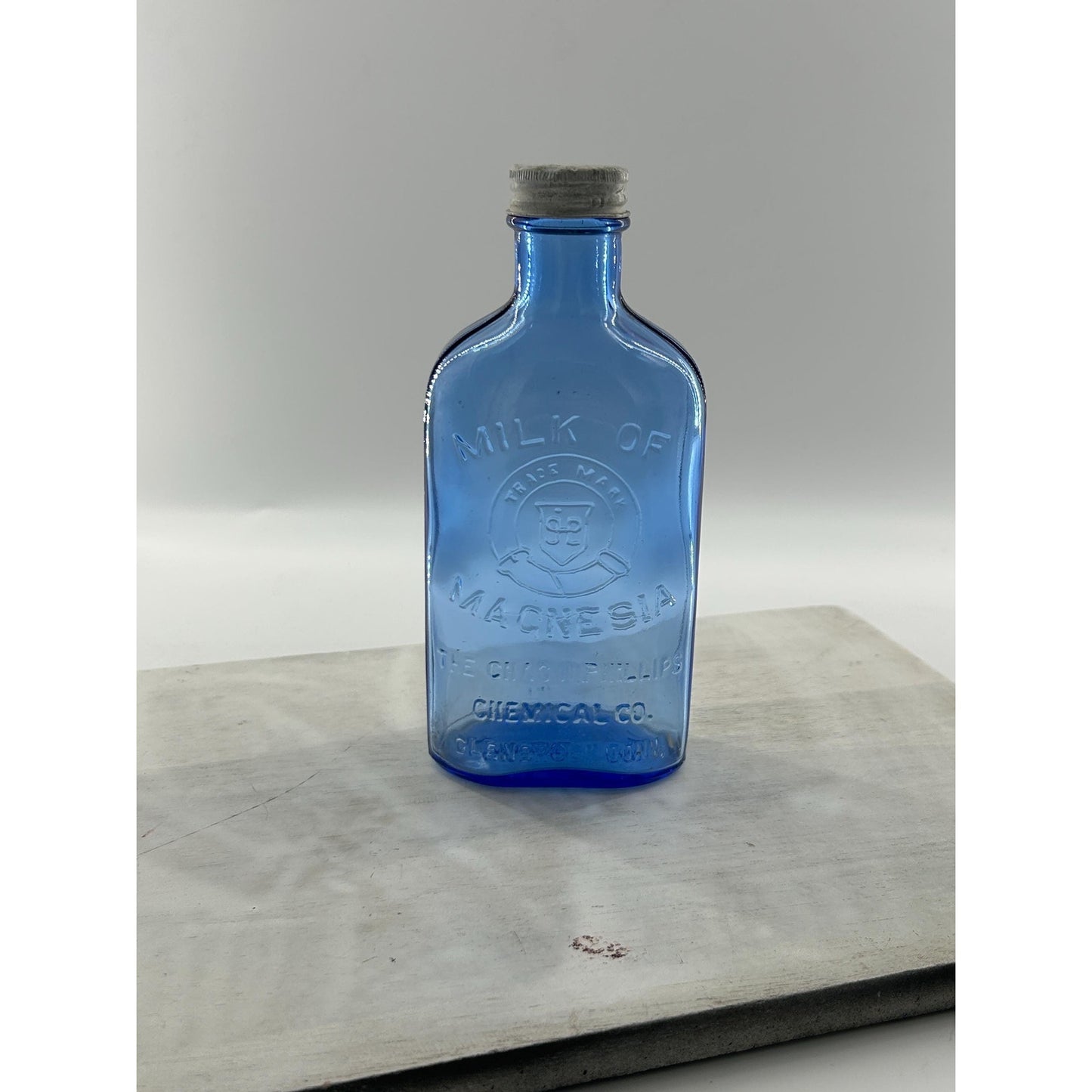 Antique Apothecary Milk of Magnesia Bottle c. 1910–1925 | Blue Glass Chas H Phillips Chemical Co. Cobalt blue apothecary bottle decor