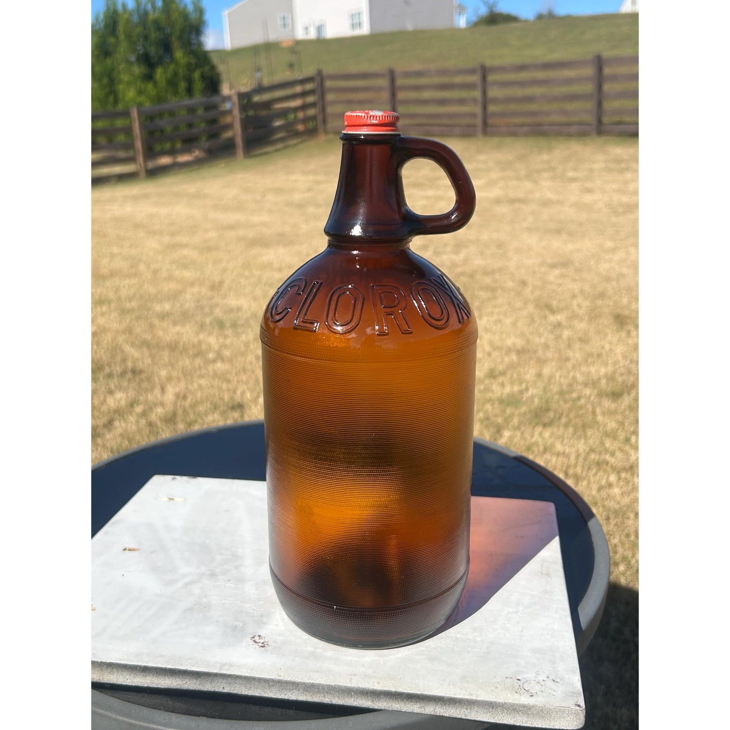 Lot of 2 Vintage Clorox Brown Glass Jugs – 1 Gallon & Half Gallon, Embossed Amber Bottles w/ Original Caps, 1940s–1950s Bleach Bottles