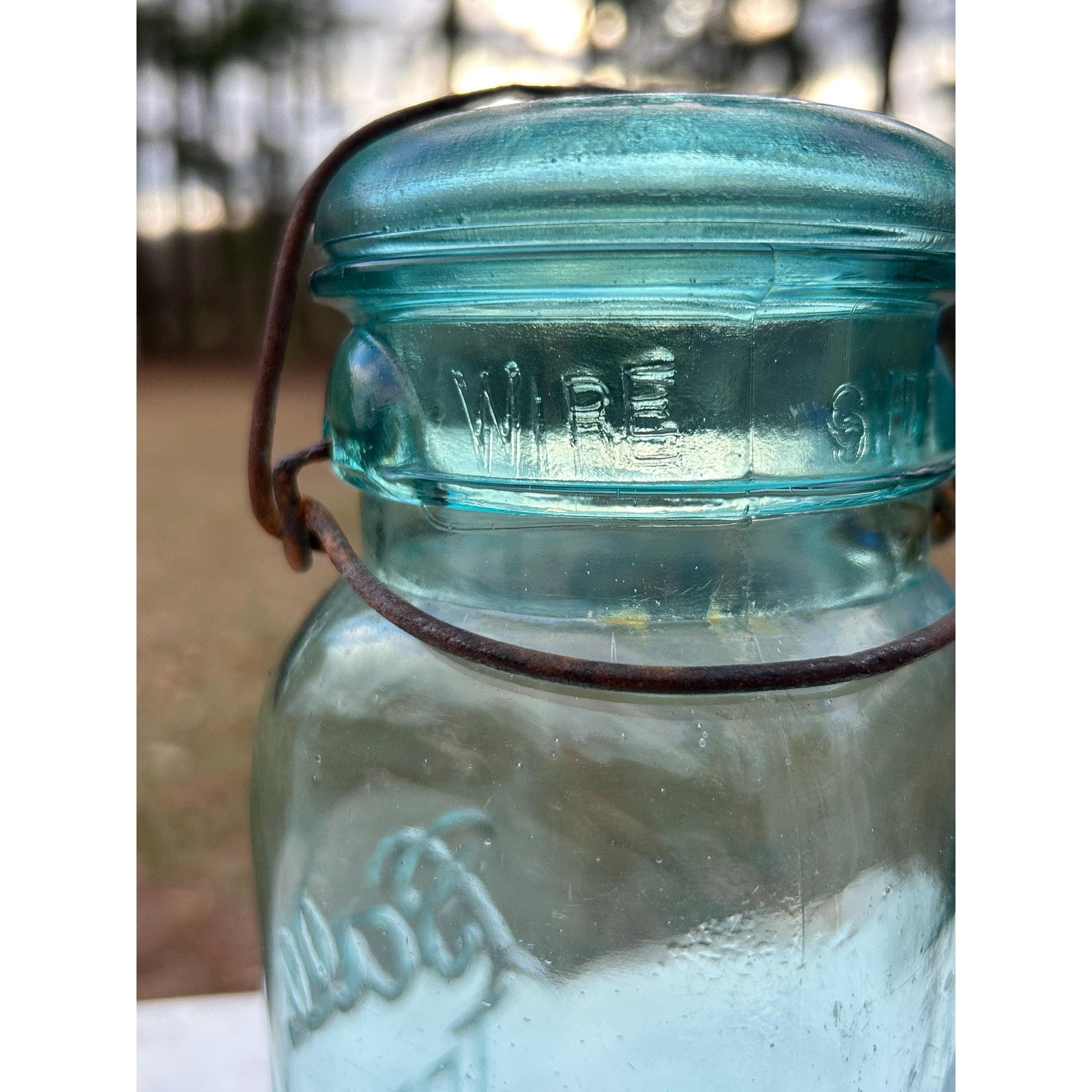 Ball Ideal square aqua mason jar top view bail lid