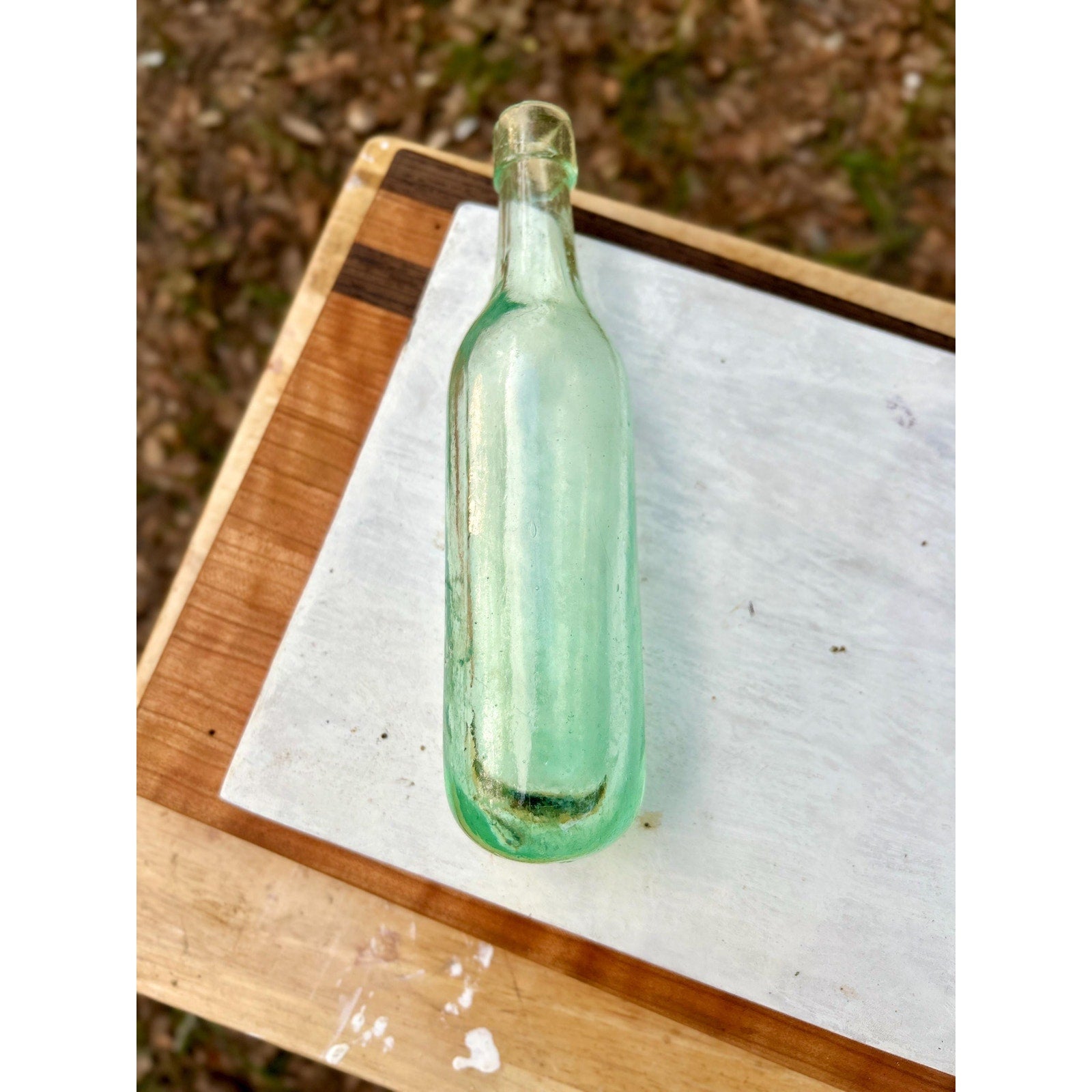 Antique aqua bottle showing applied collar finish and tooled lip detail