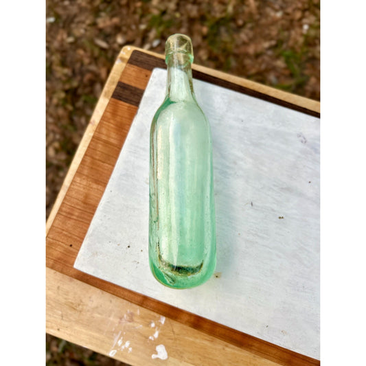 Antique aqua bottle showing applied collar finish and tooled lip detail