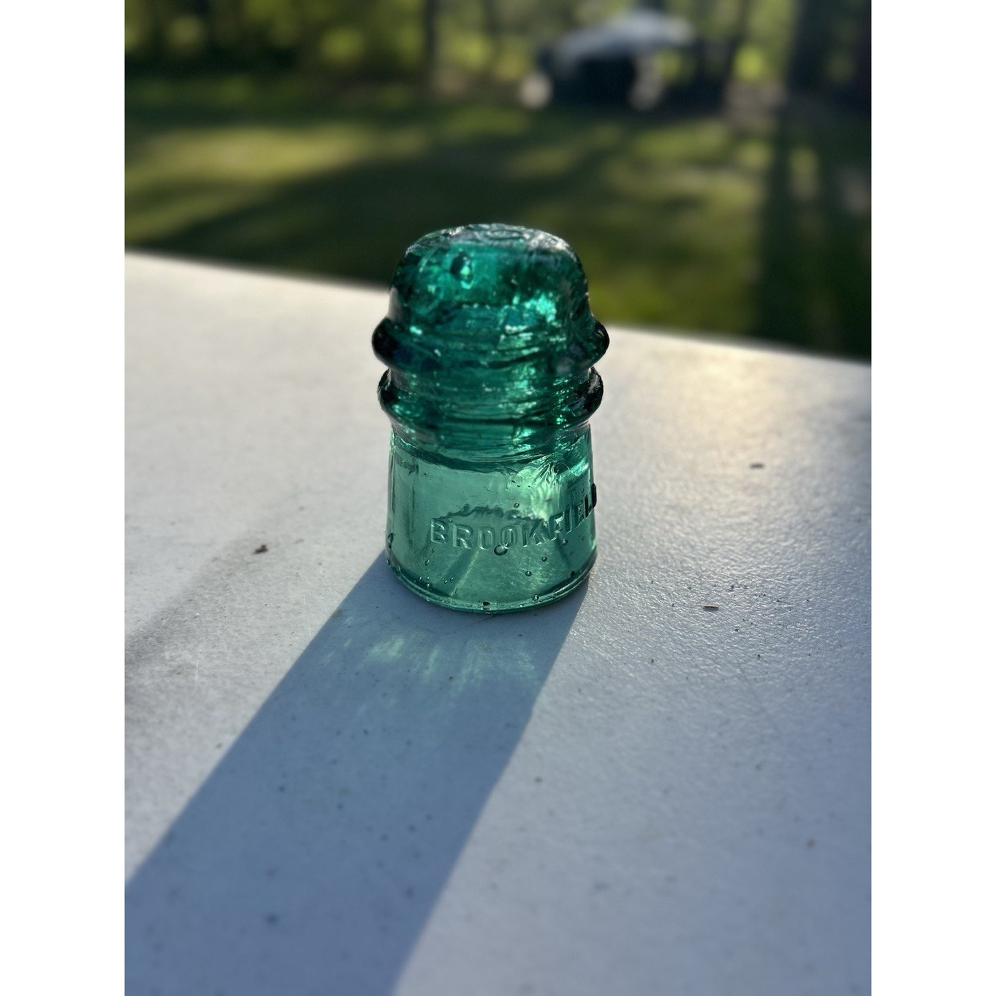 Vintage Brookfield Glass Insulator — Dark Emerald Green with Heavy Bubble Glass