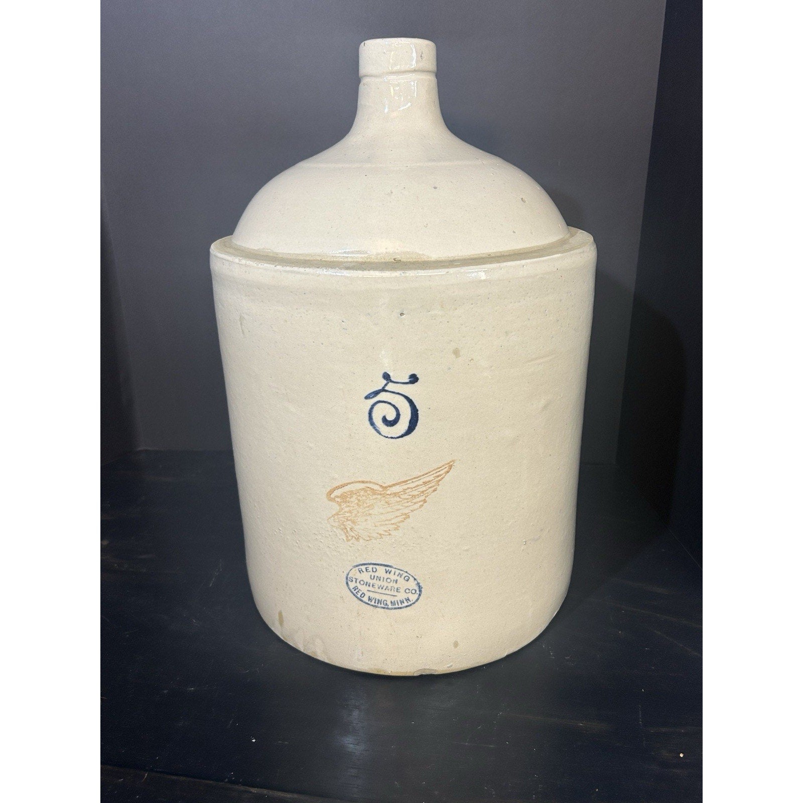 Red Wing 5 gallon crock shoulder jug 4 inch wing logo detail