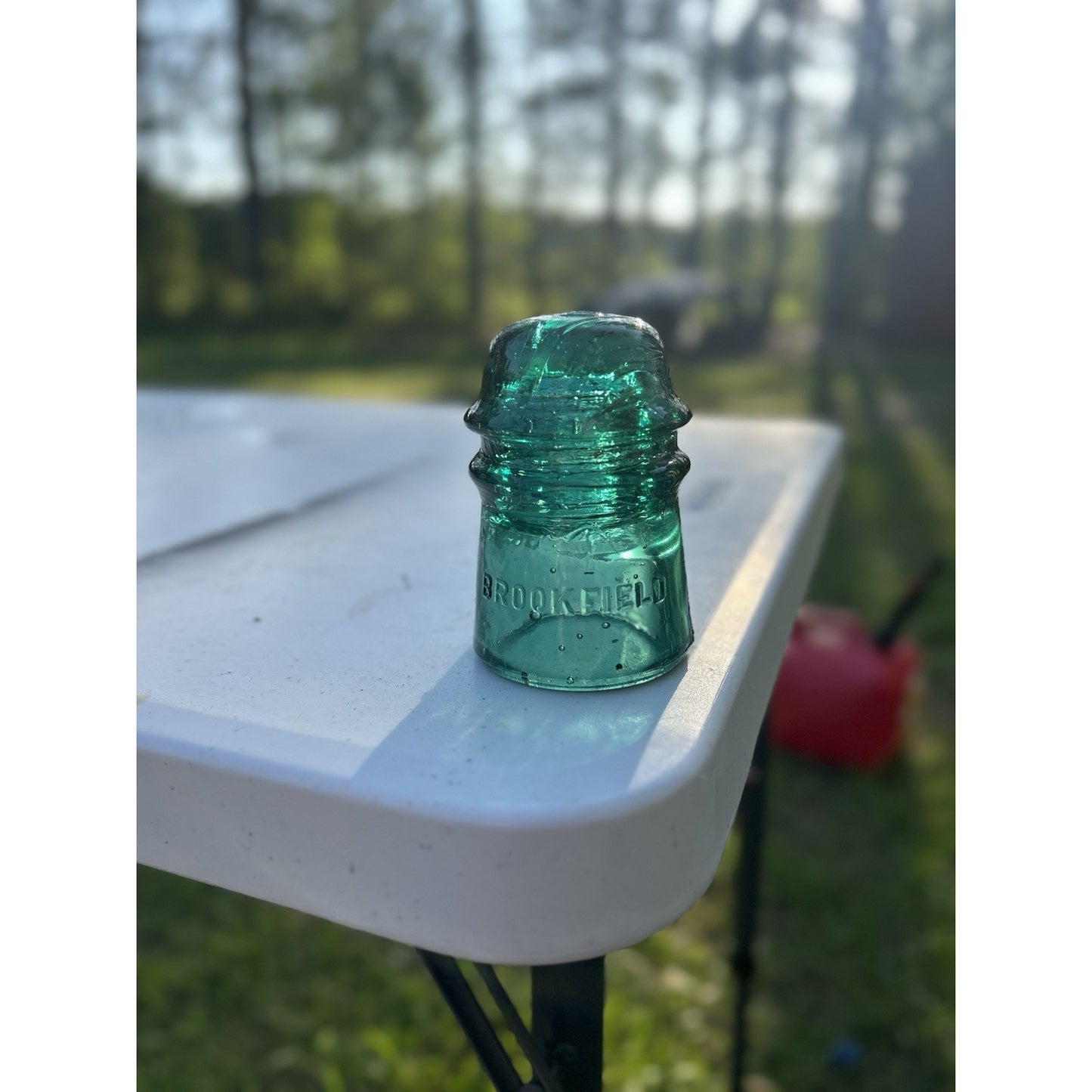 Vintage Brookfield Glass Insulator — Dark Emerald Green with Heavy Bubble Glass