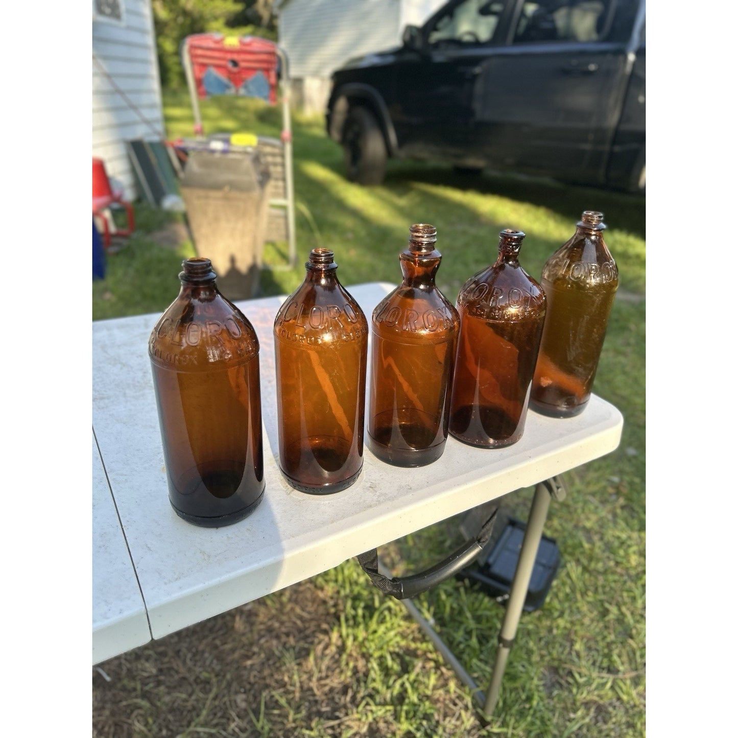 Vintage Clorox Glass Bottle Collection — Five Bottles — 1932–1955 — Amber & Brown