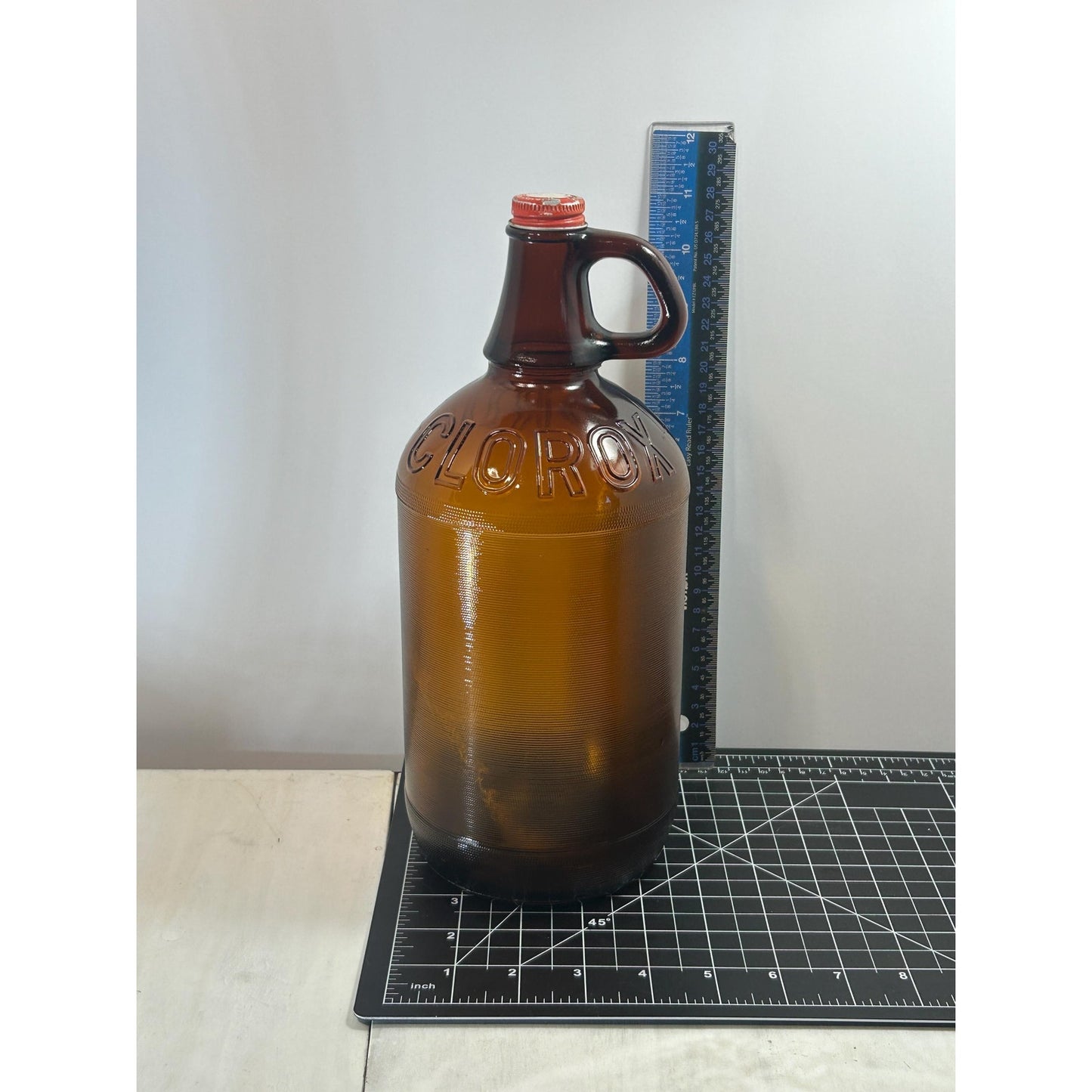 Lot of 2 Vintage Clorox Brown Glass Jugs – 1 Gallon & Half Gallon, Embossed Amber Bottles w/ Original Caps, 1940s–1950s Bleach Bottles