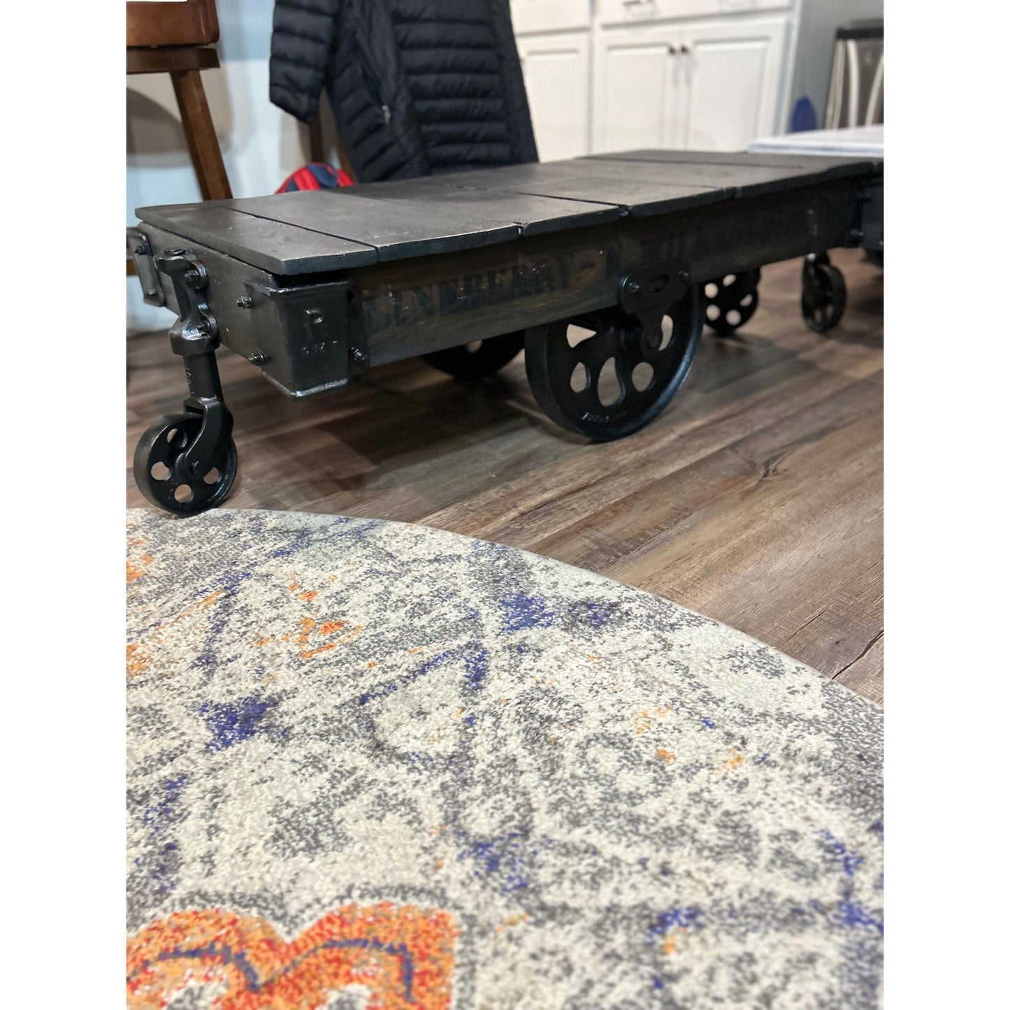 Lineberry factory cart end view — 27 inch width, 14.5 inch height, original iron caster assembly