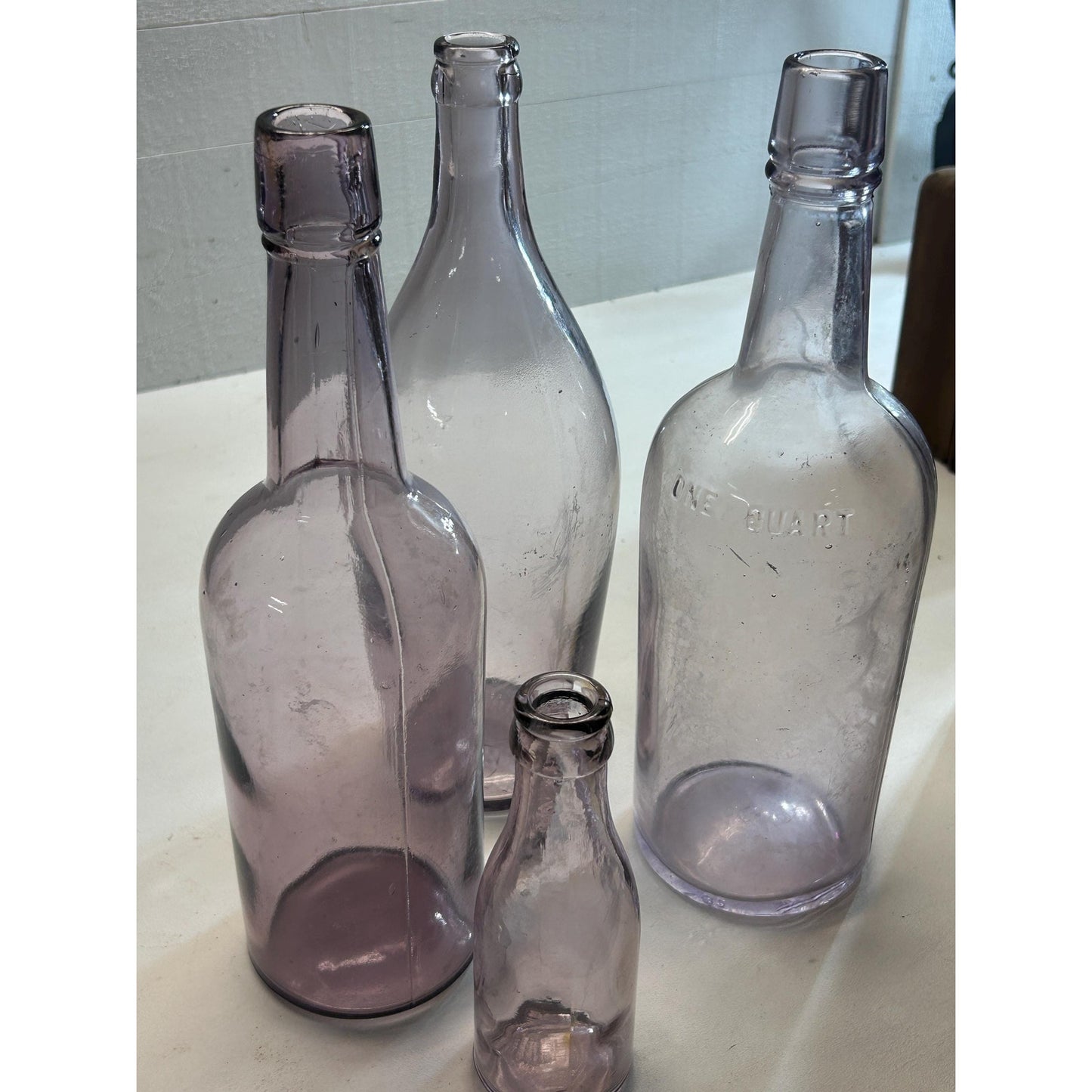 Set of 4 Antique Purple Glass Bottles Sun Co Early 1900s Hand Blown Apothecary Bottles Collectible Display