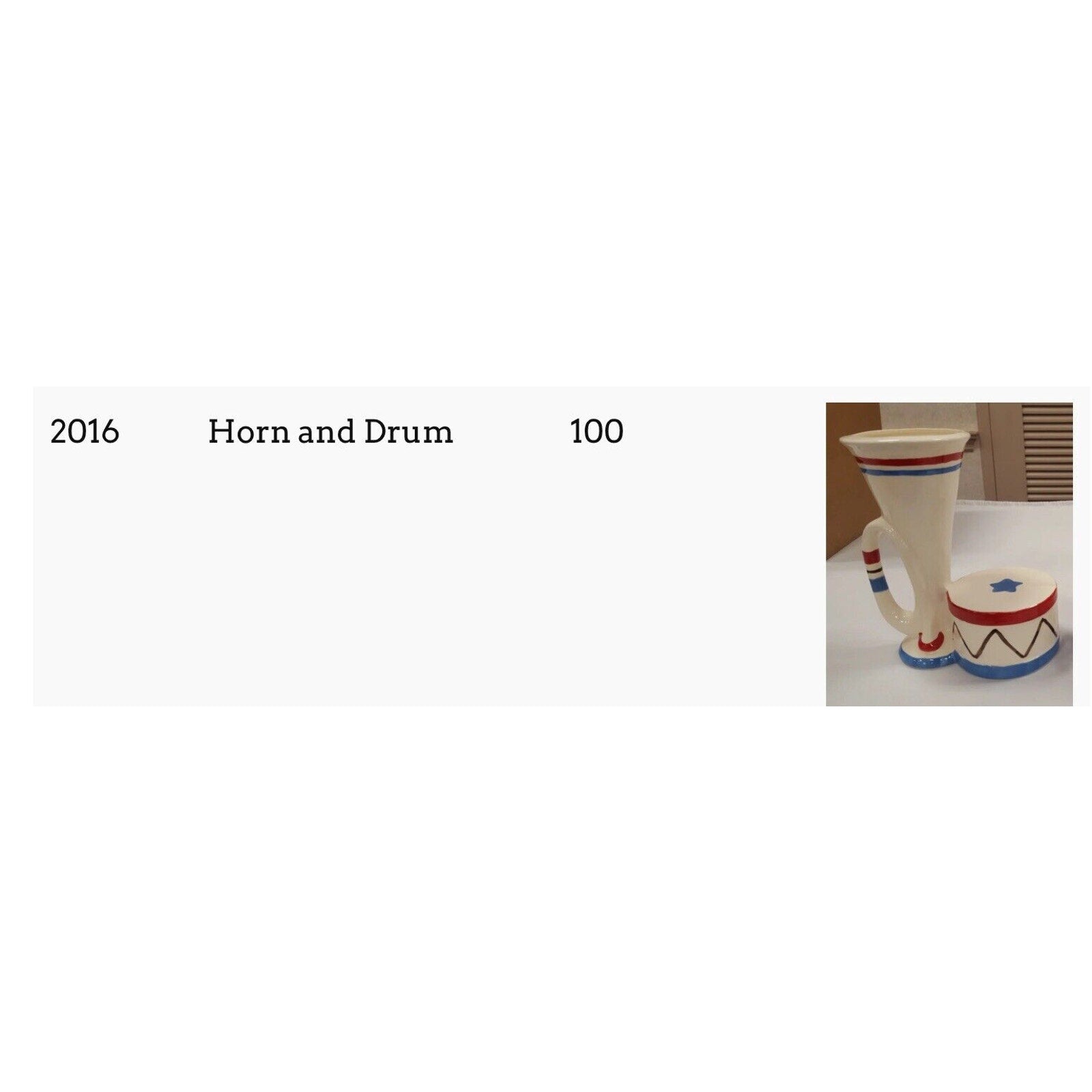 Hull Pottery 2016 Horn and Drum close-up showing drum and horn relief decoration in buff and brown glaze