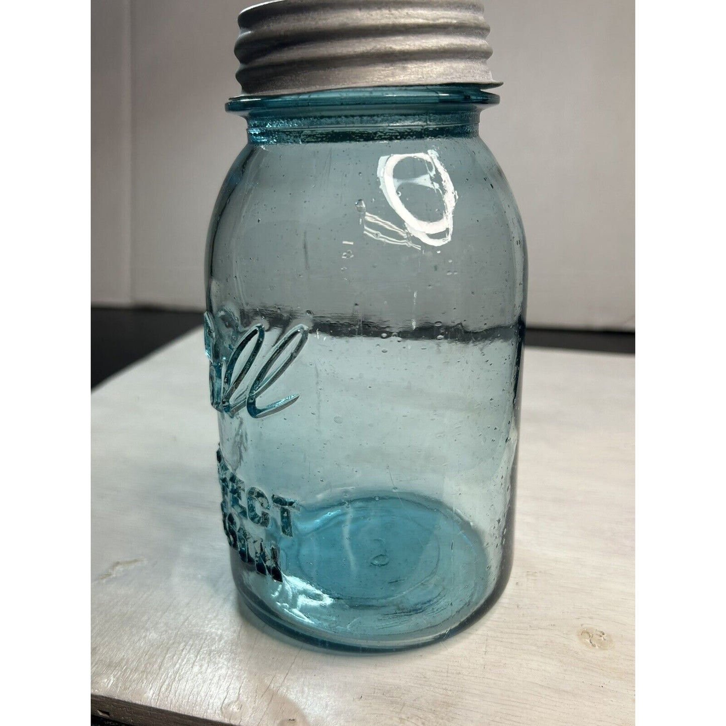 Antique Ball blue Perfect Mason quart — three-quarter view showing deep embossed lettering and glass color