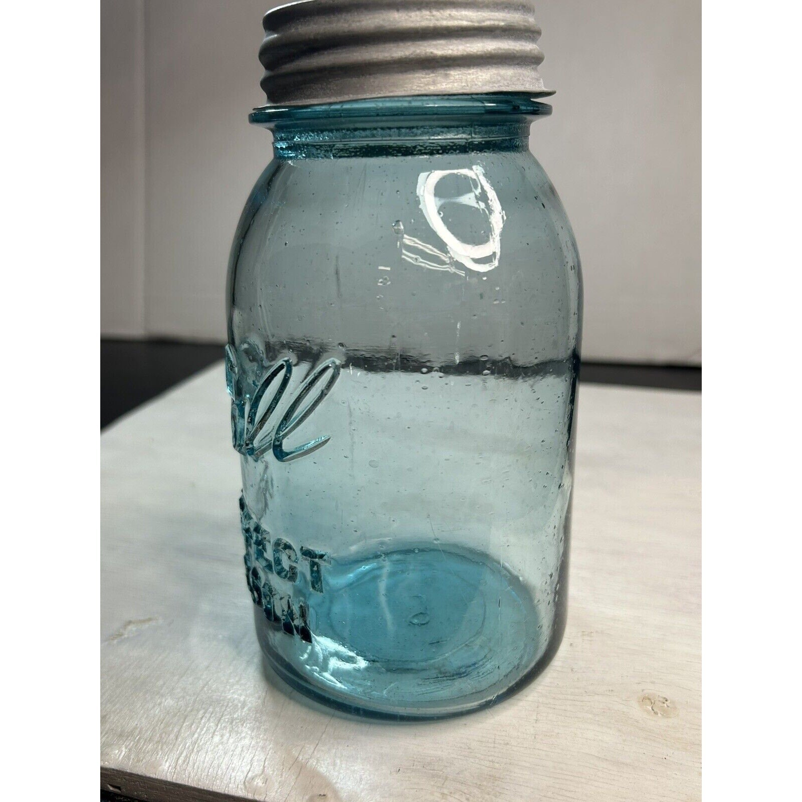 Antique Ball blue Perfect Mason quart — three-quarter view showing deep embossed lettering and glass color