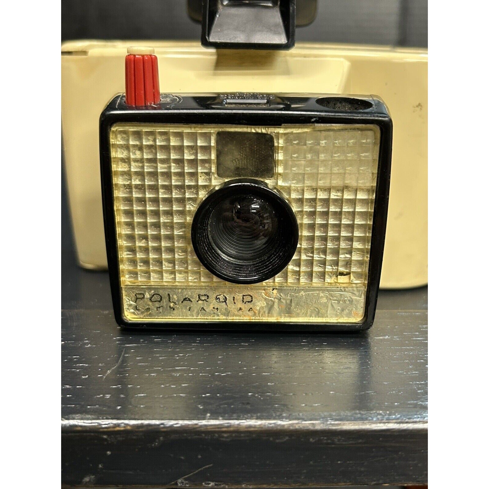 1960s Polaroid Swinger camera base detail logo