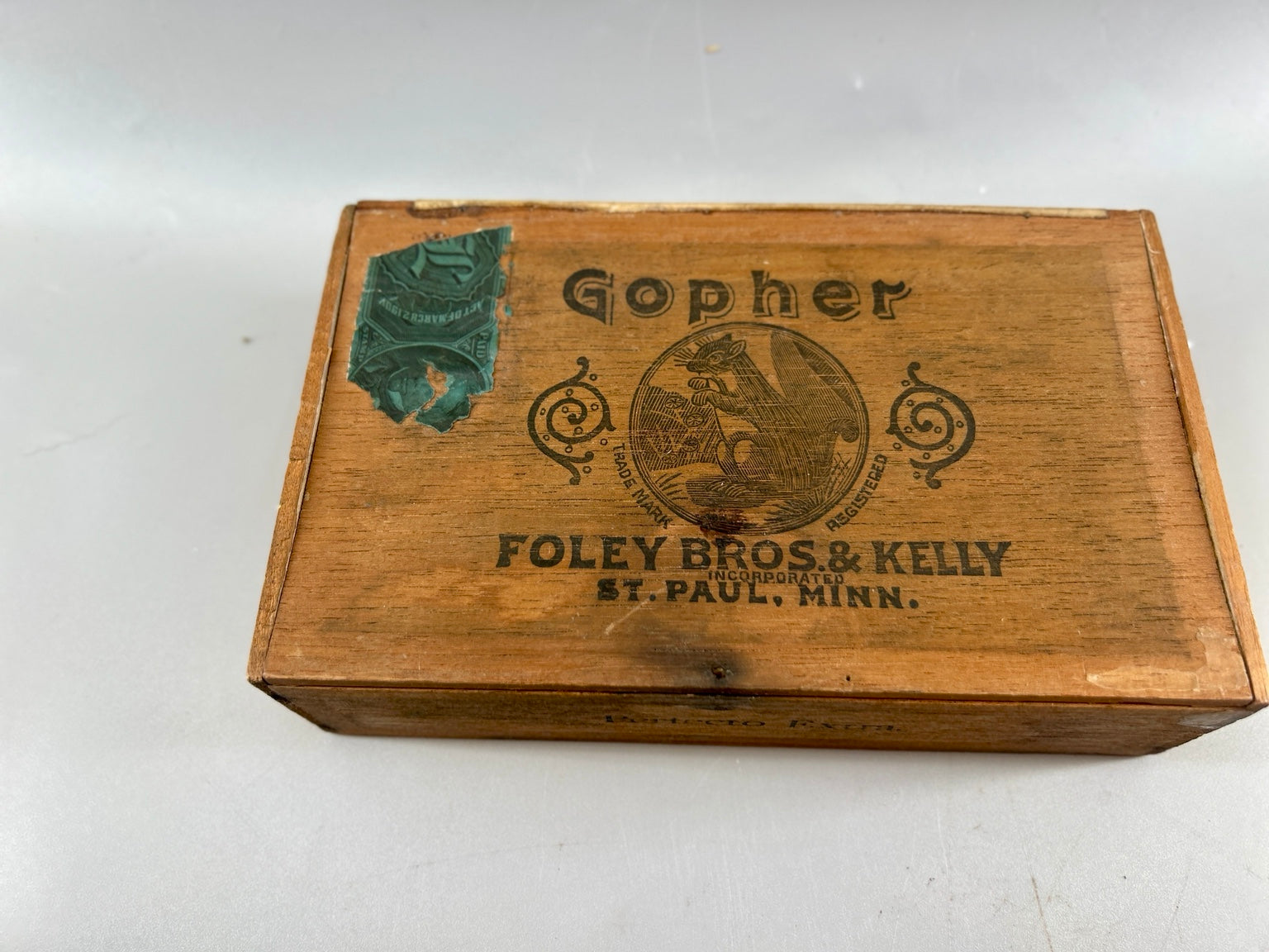 Exterior lid branding on antique Foley Bros. & Kelly Gopher cigar box