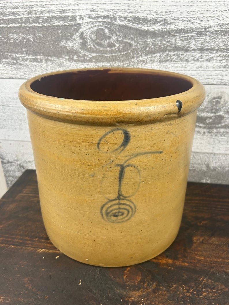Alternate front view emphasizing the rounded lip and hand-painted cobalt marking.