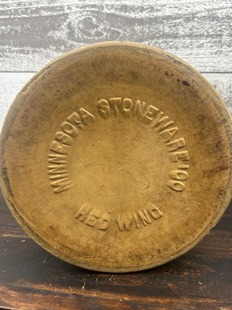 Bottom view showing the circular base and impressed Minnesota Stoneware Company mark.