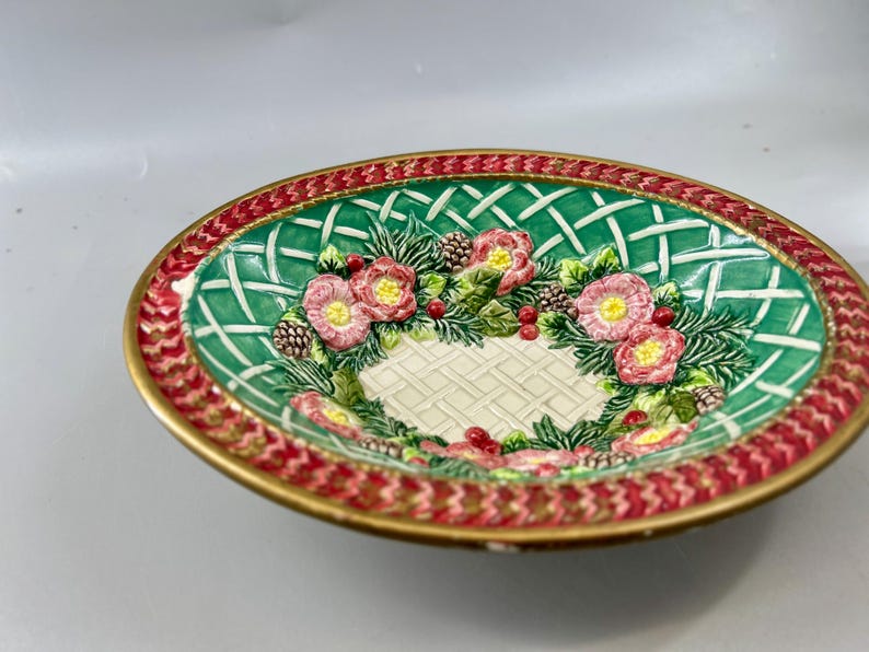 Low side angle showing the raised rim and shallow serving-bowl depth.
