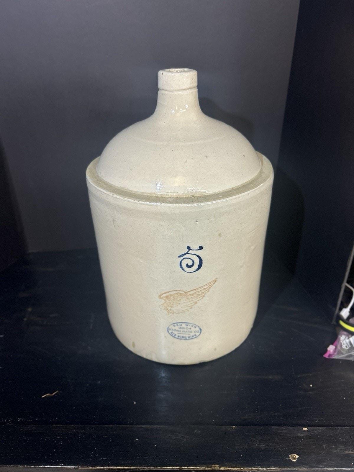 Four inch Red Wing logo detail on stoneware jug