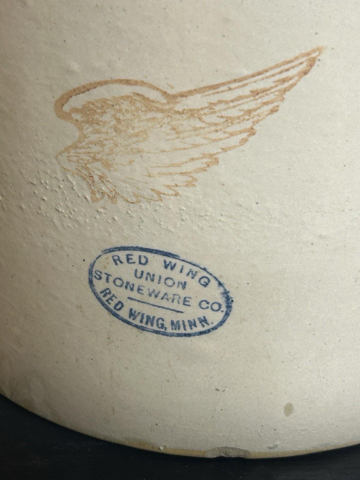 Base and heel of antique Red Wing shoulder jug
