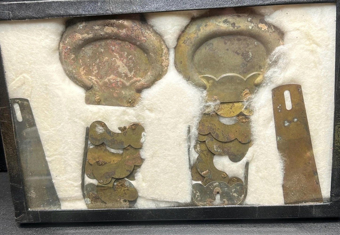 Copper relics attributed to Civil War sites in a 1931 to 1933 labeled Riker mount