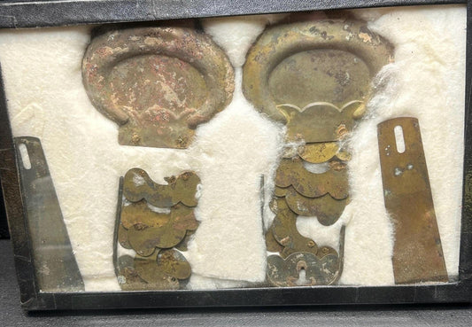 Copper relics attributed to Civil War sites in a 1931 to 1933 labeled Riker mount