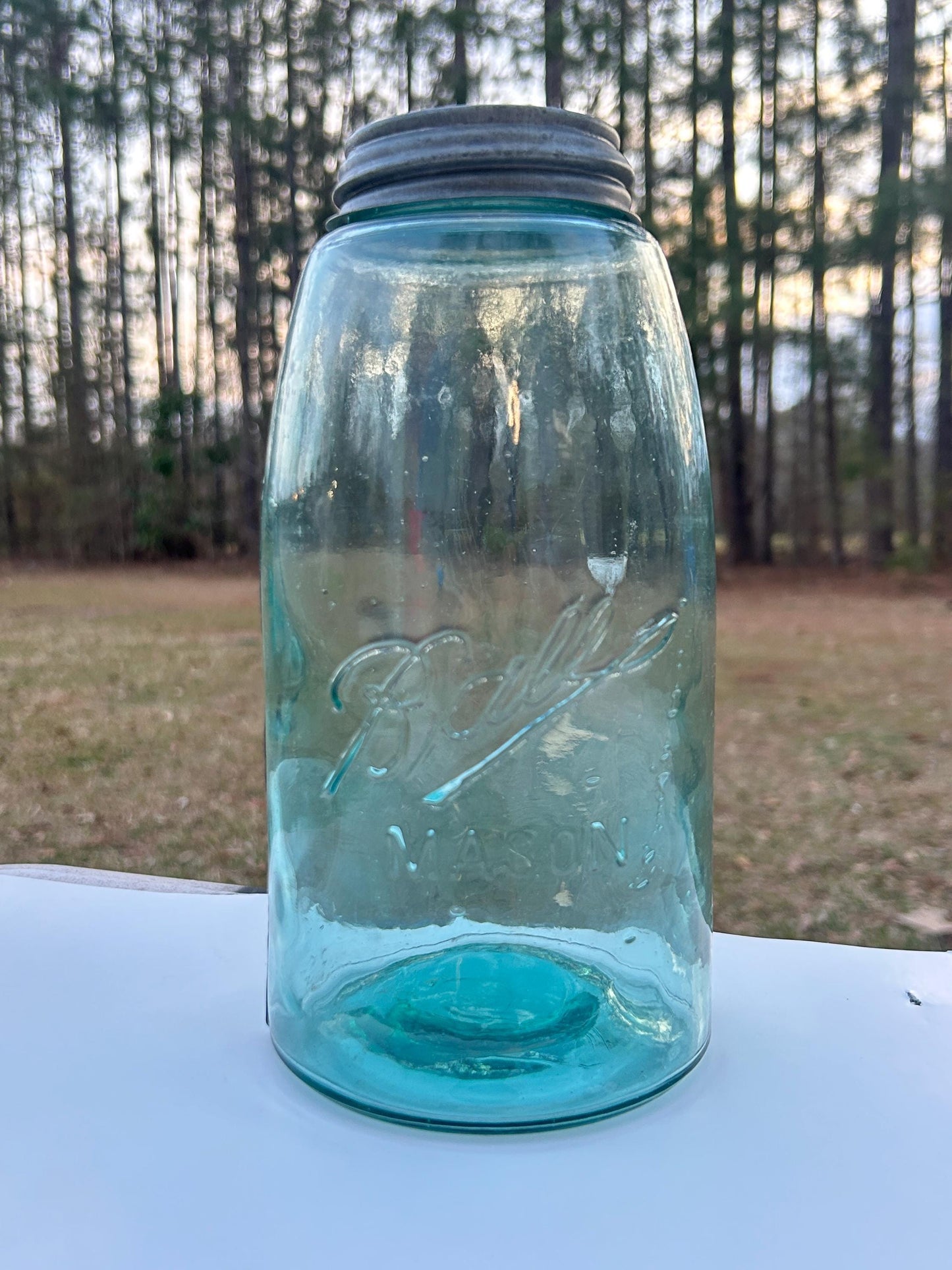 Half gallon Ball jar side and glass movement