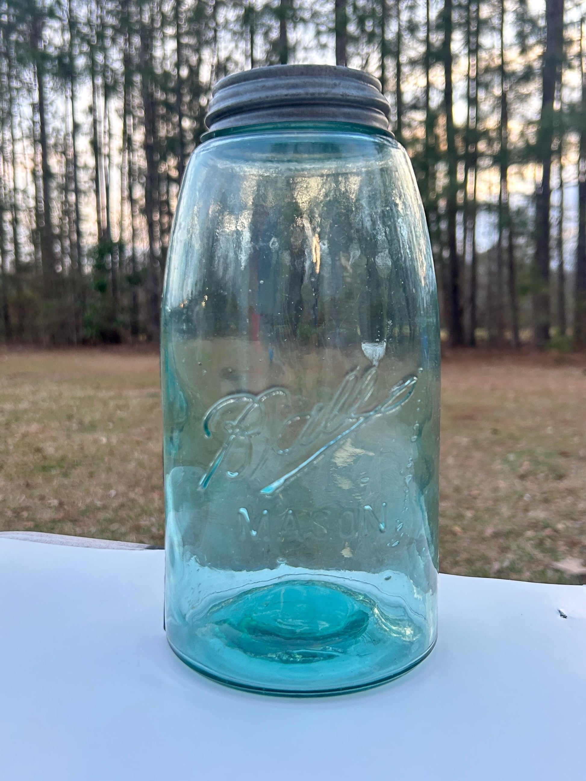 Half gallon Ball jar side and glass movement