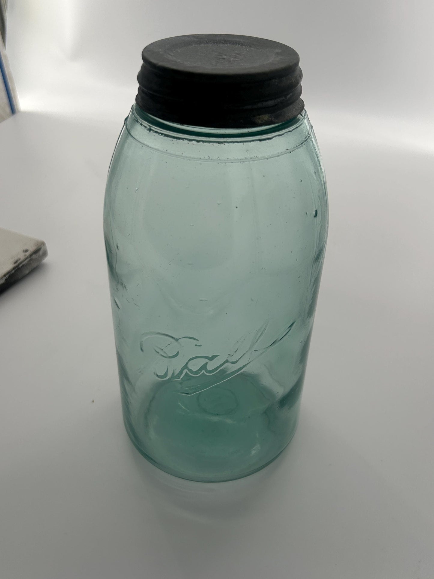 Seed bubbles in early Ball jar glass