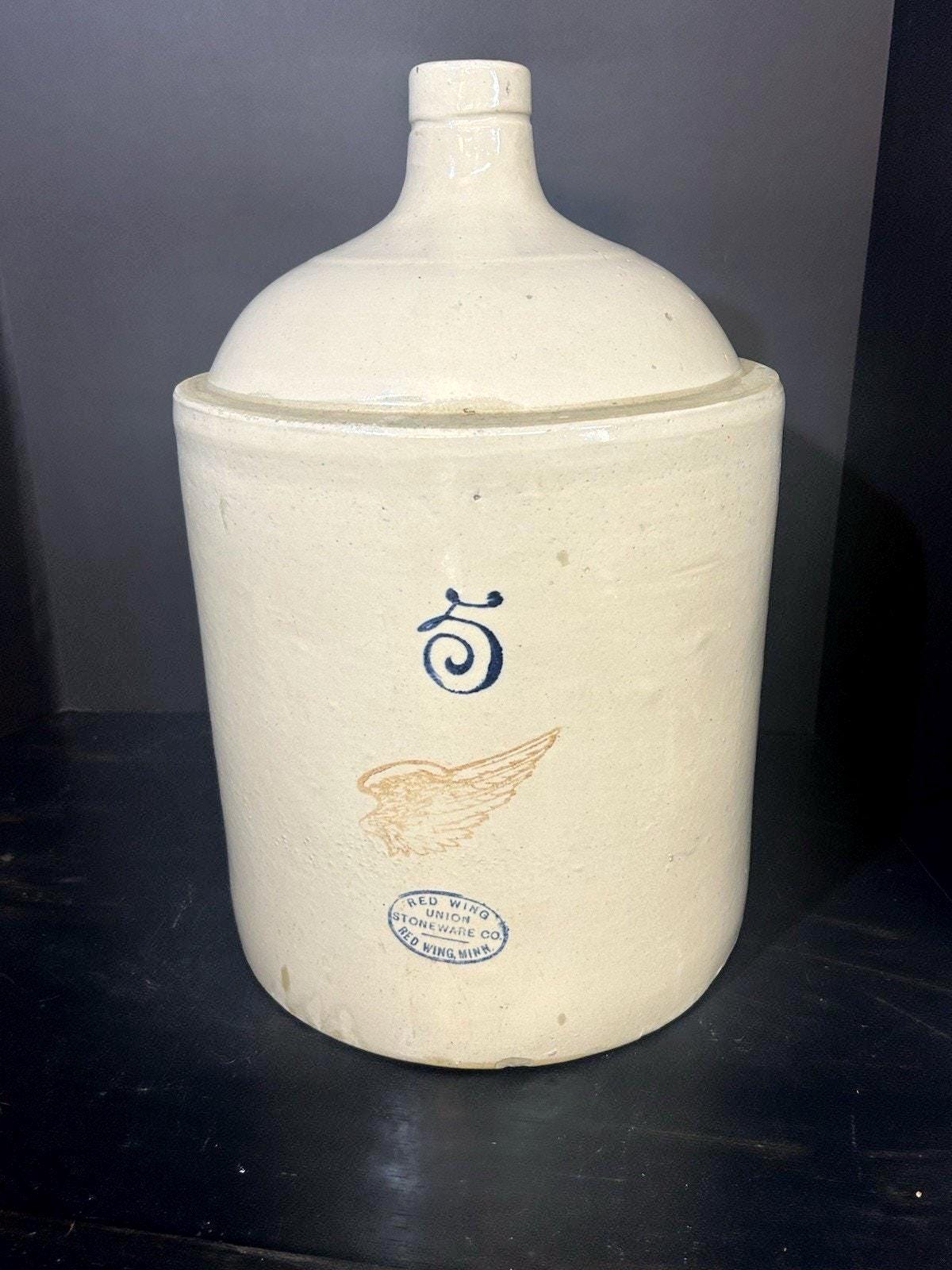 Antique Red Wing 5 gallon stoneware shoulder jug with wing logo