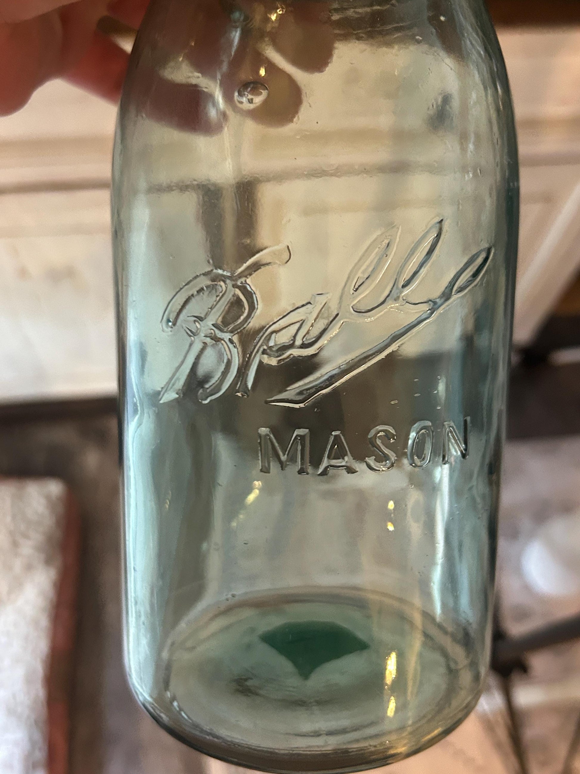 Antique half gallon aqua mason jar side view